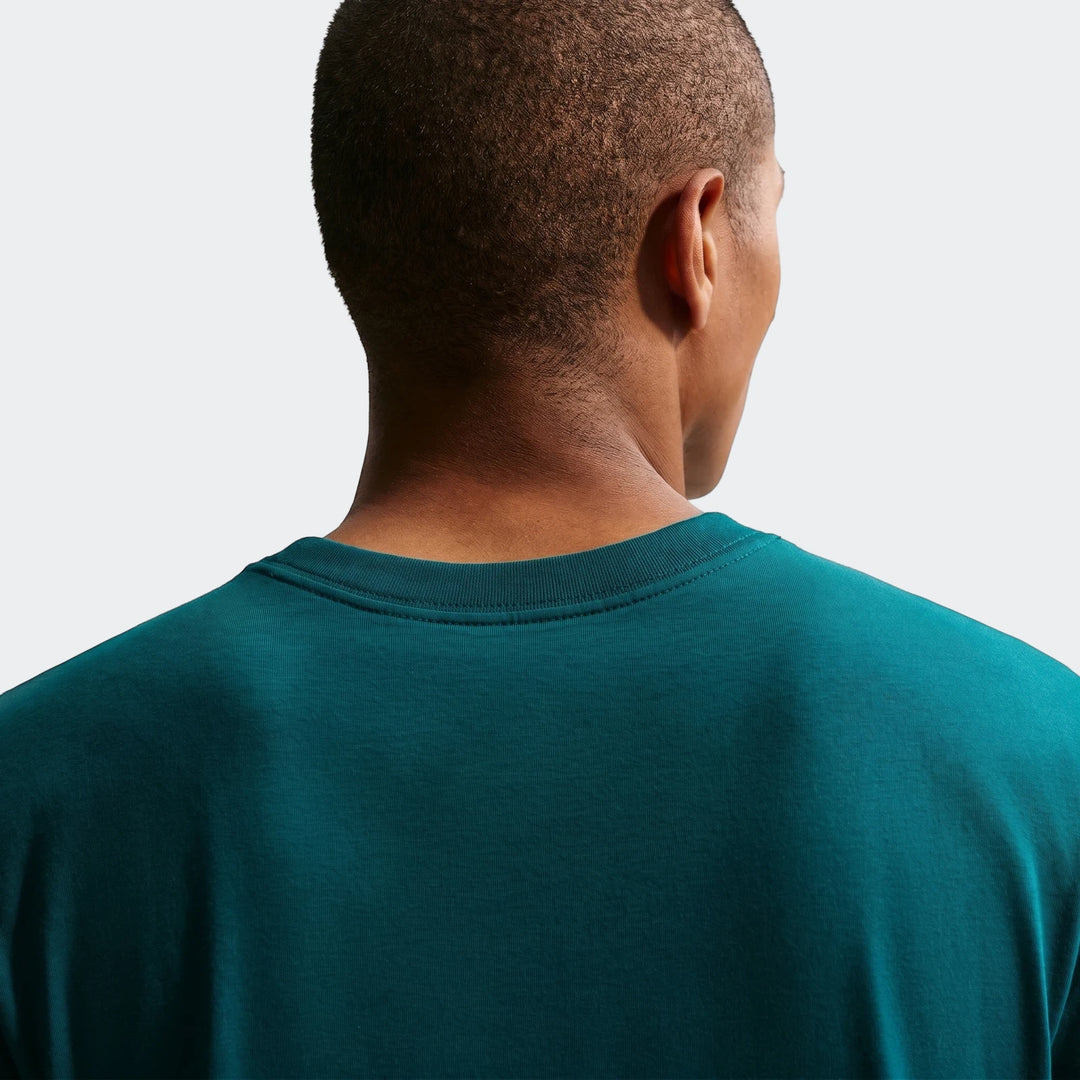 Back view of a Brazil Green Men's Nike Soccer T-Shirt, showcasing the dark teal fabric and crew neck collar.