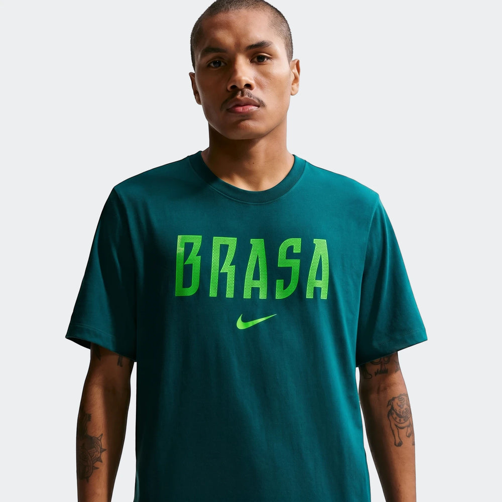 Men's Brazil Green Nike Soccer T-shirt on a model, featuring 'BRASA' text and Nike swoosh on the chest.