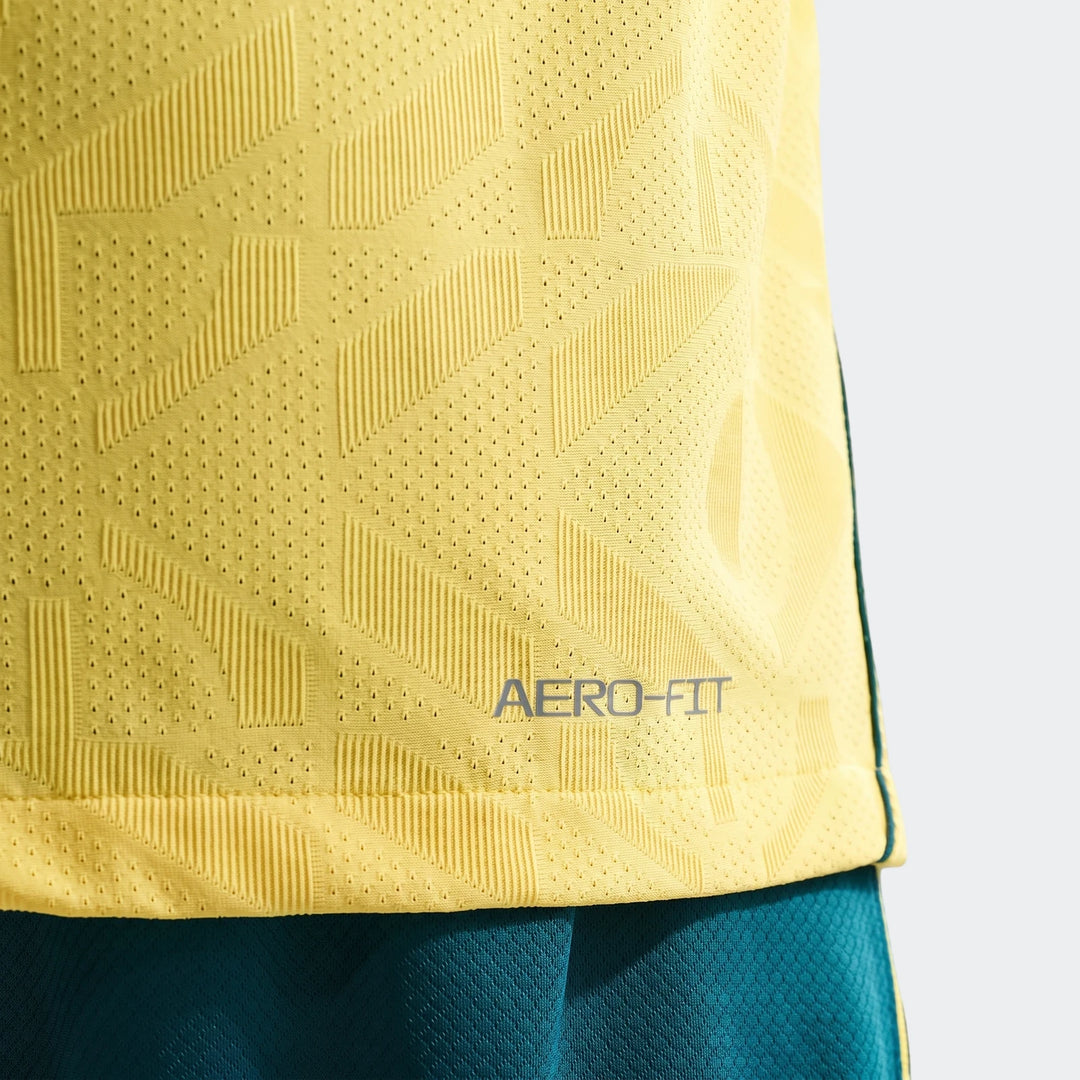 Close-up of a men's Brazil National Team 2026 Match Home Nike Aero-Fit soccer jersey in yellow, showing textured fabric and