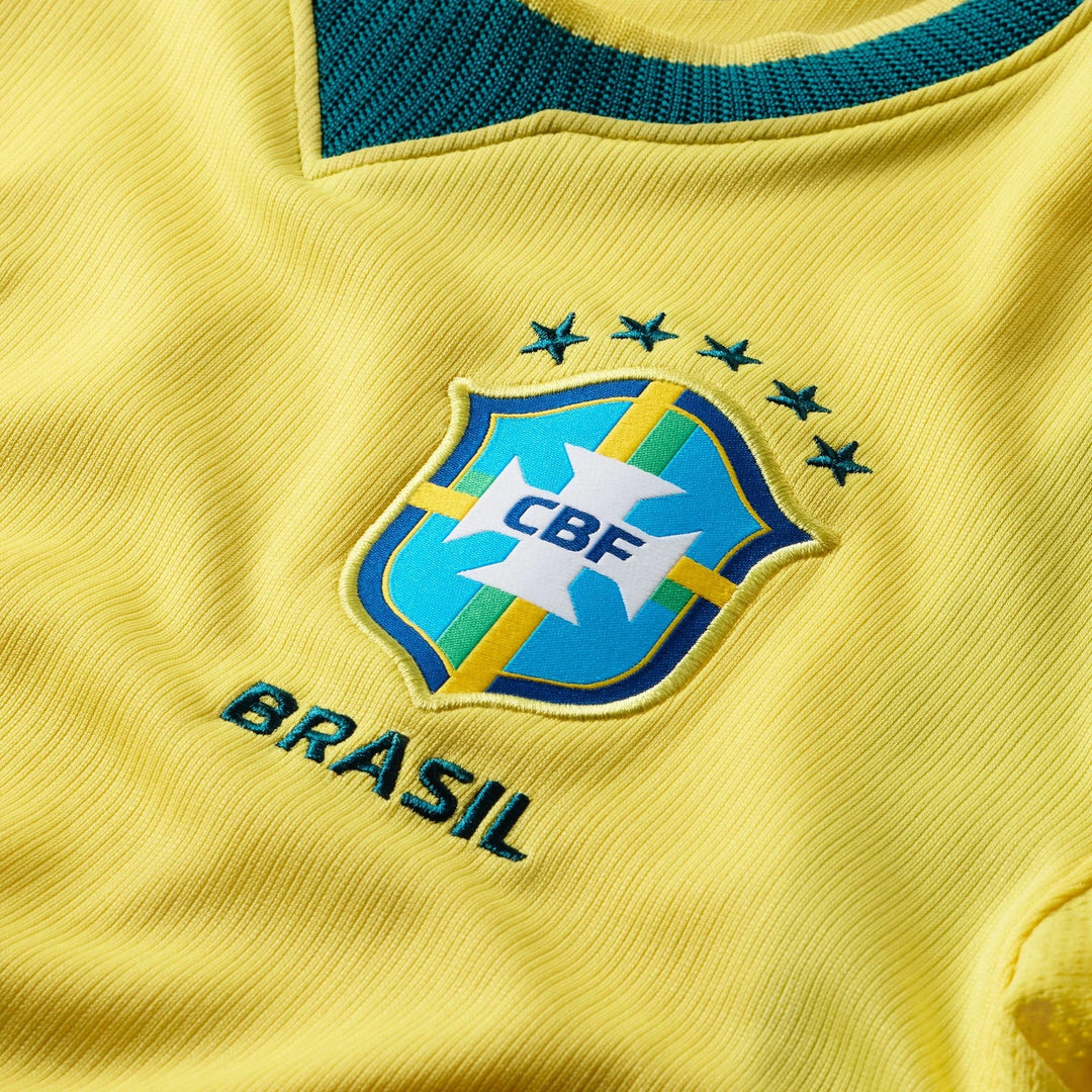 Close-up of a yellow Brazil National Team 2026 Stadium Home Nike Dri-Fit Soccer Jersey, showing the embroidered team crest