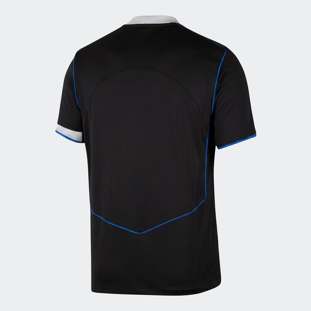 Back view of the Cfc Y Lk Df Jsy Ss Stad 3Rd 25/26 Black Tops, a short-sleeve jersey with blue piping details.