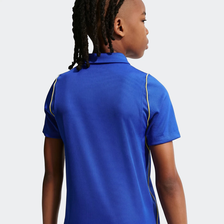 Rear view of a big kid wearing the Chelsea FC 2026/27 Stadium Home Blue Nike Dri-Fit Soccer Replica Jersey.