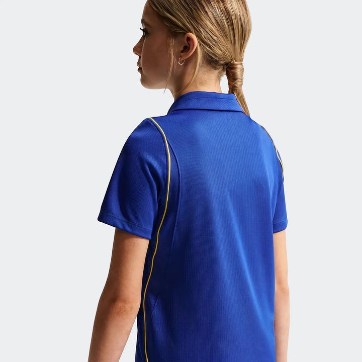 Back view of a young person wearing a blue Chelsea FC 2026/27 Stadium Home Nike Dri-Fit Soccer Replica Jersey with yellow