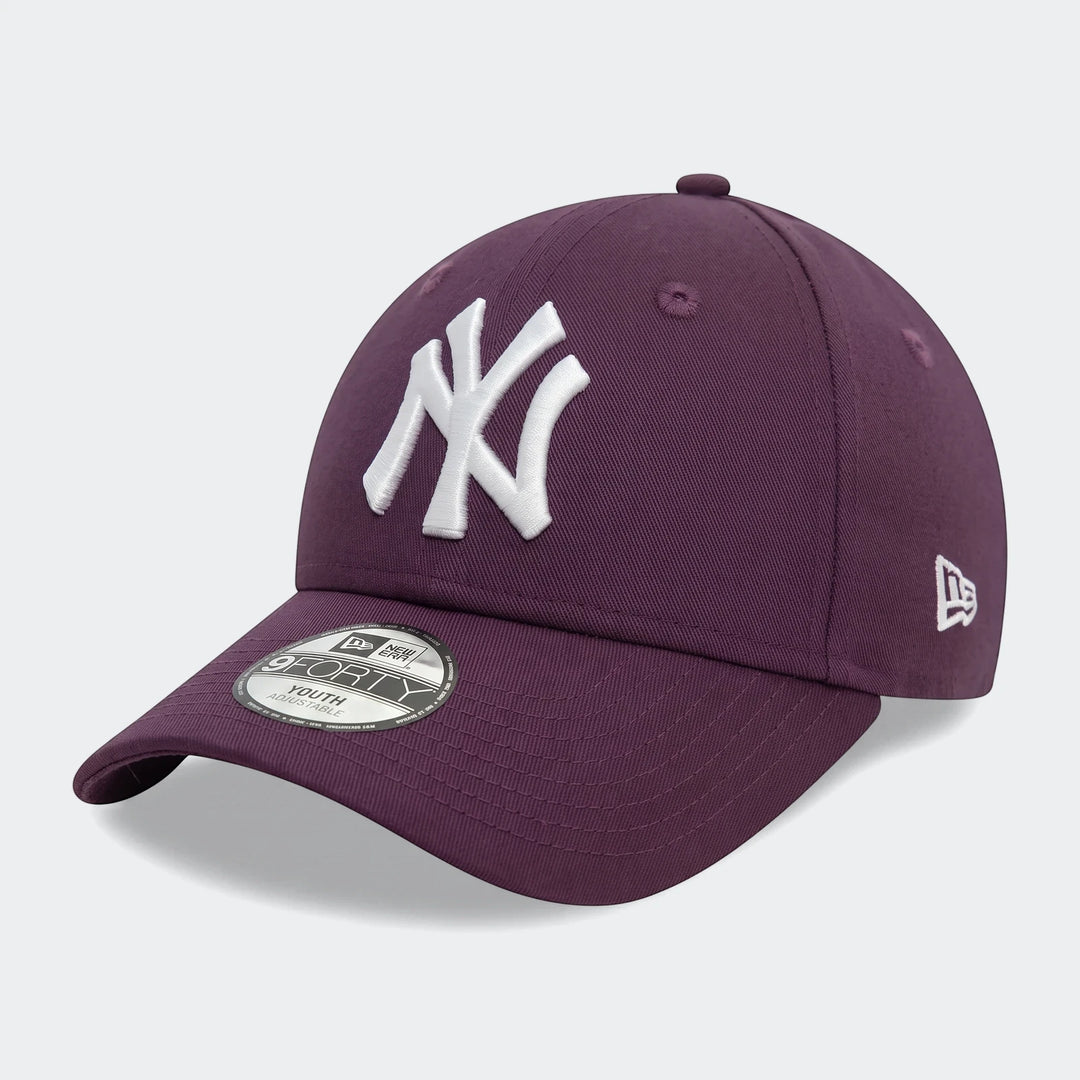 Purple New York Yankees 9FORTY Youth adjustable baseball cap with a white embroidered NY logo, shown from an angled front