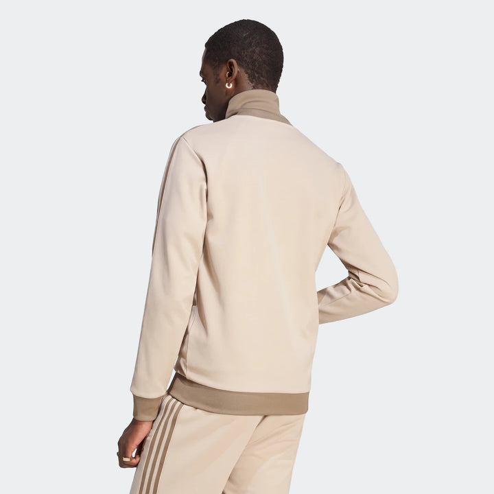 Classic Track Top in beige, back view showcasing a high-neck collar and ribbed cuffs and hem.