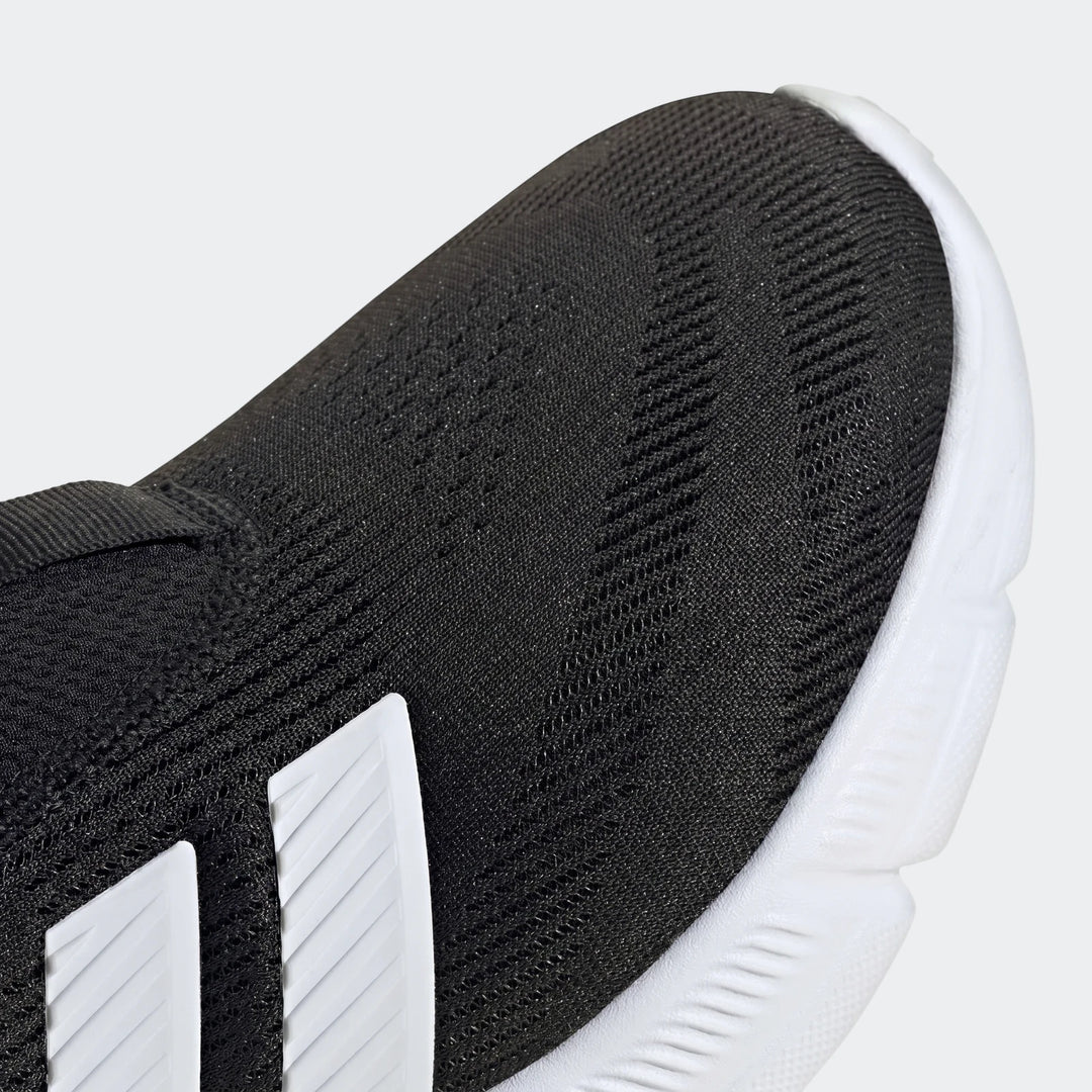 Close-up of Cloudfoam Flex Lounge Rapidaflow Shoes, black mesh upper with white stripes and white sole, side view.