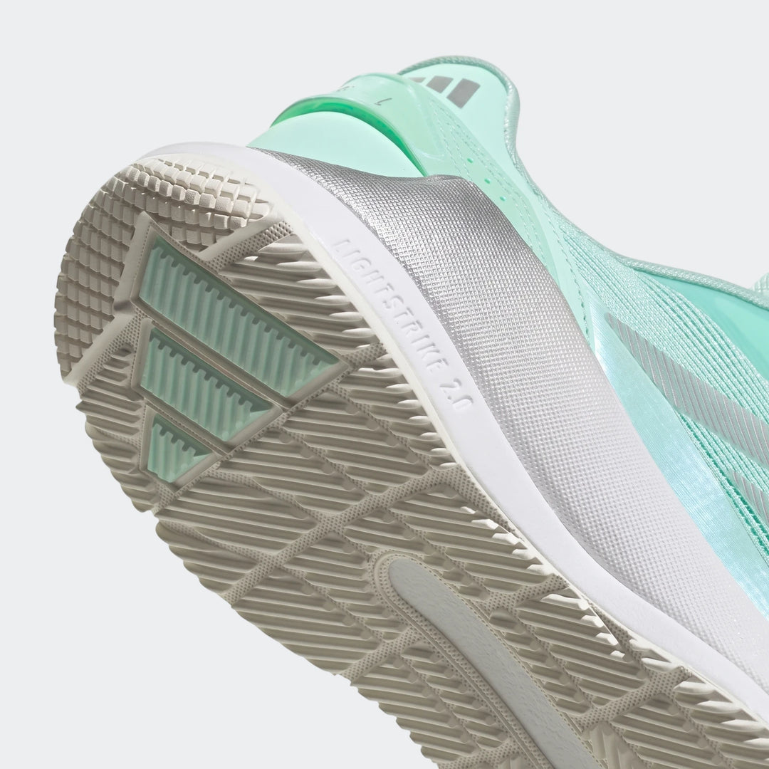 Mint green and silver Crazyquick Lightstrike Padel Shoe, close-up angled view of the textured outsole and "Lightstrike 2.0"