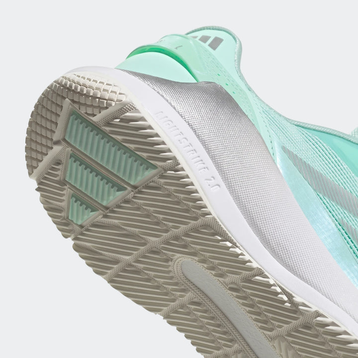 Mint green and silver Crazyquick Lightstrike Padel Shoe, close-up angled view of the textured outsole and "Lightstrike 2.0"
