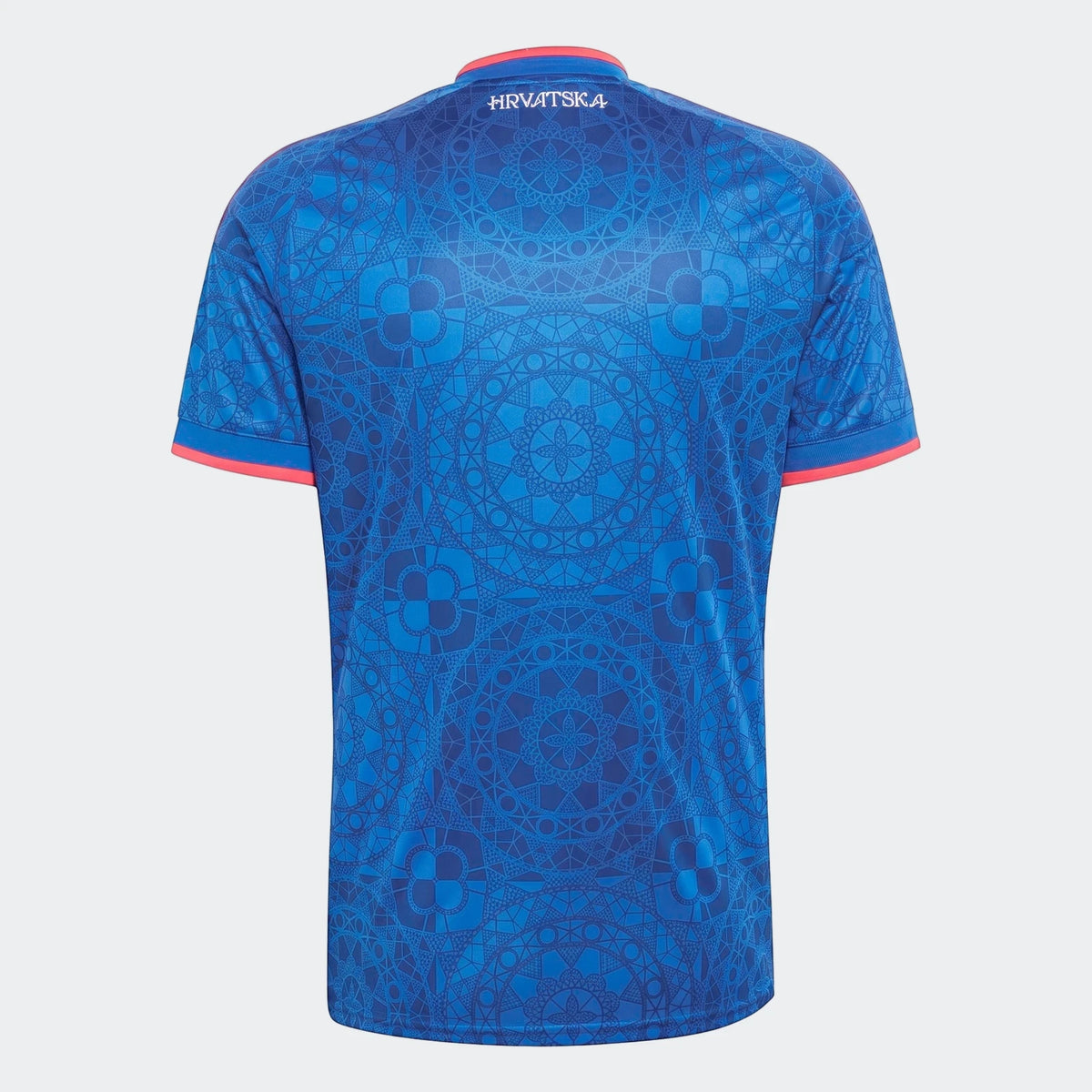A blue Croatia 26 Away Jersey, featuring an intricate geometric pattern and coral trim on the collar and cuffs, shown from