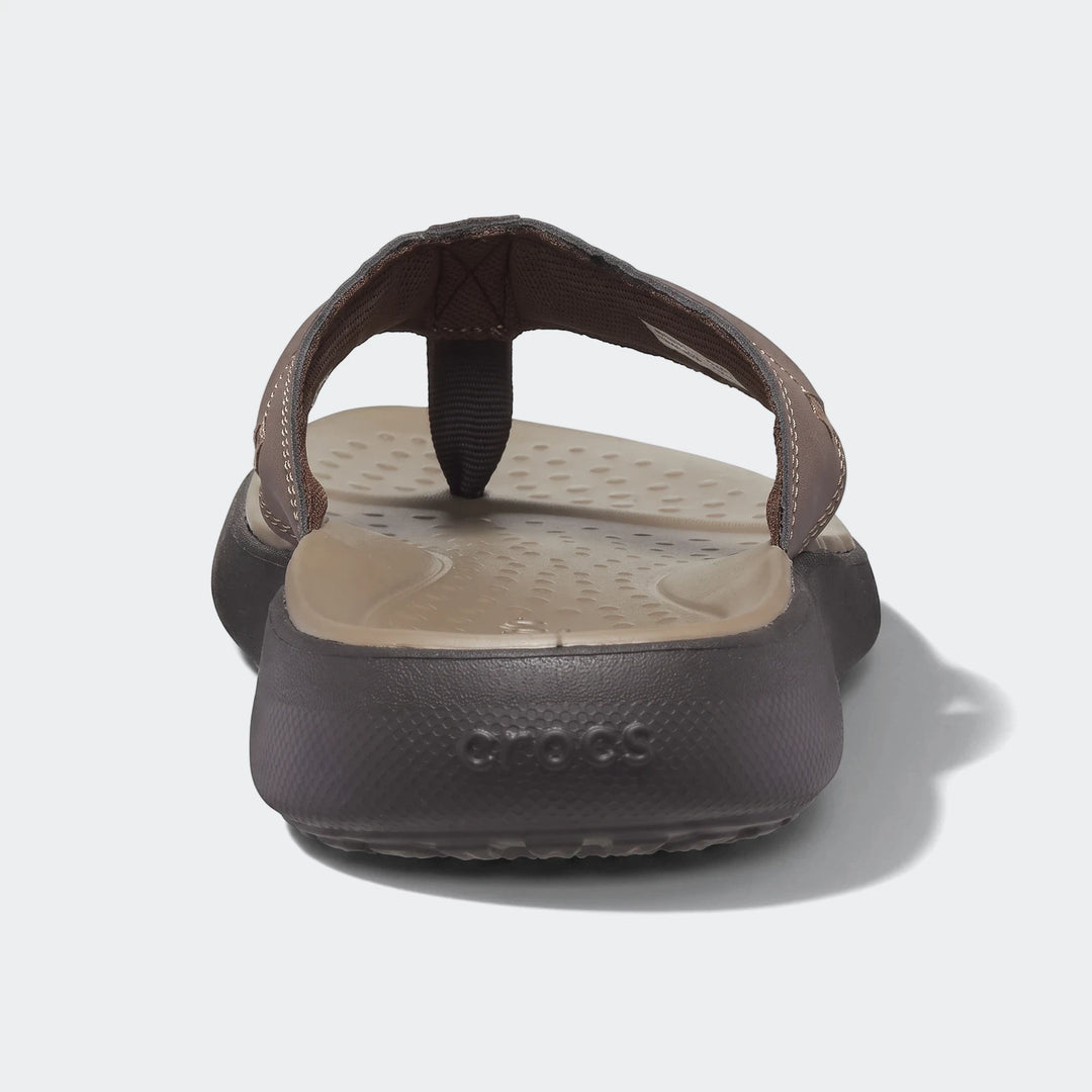 Rear view of a Crocs Yukon Vista II Literide brown men's flip-flop, featuring brown straps and a black sole for comfort.