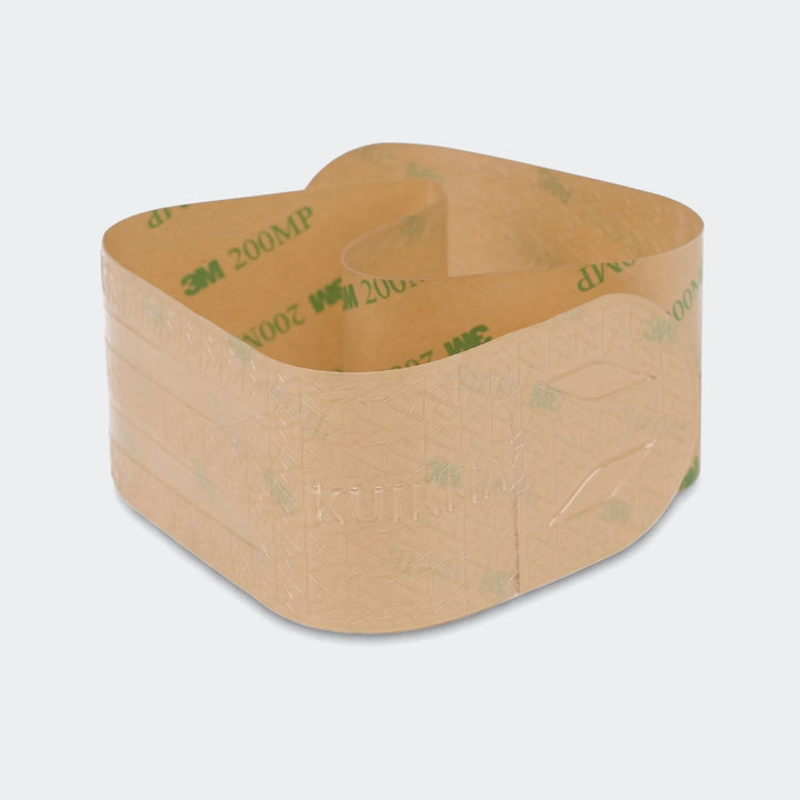 Curled 3M 200MP transparent padel protector tape, beige with green branding, for athletic equipment protection.