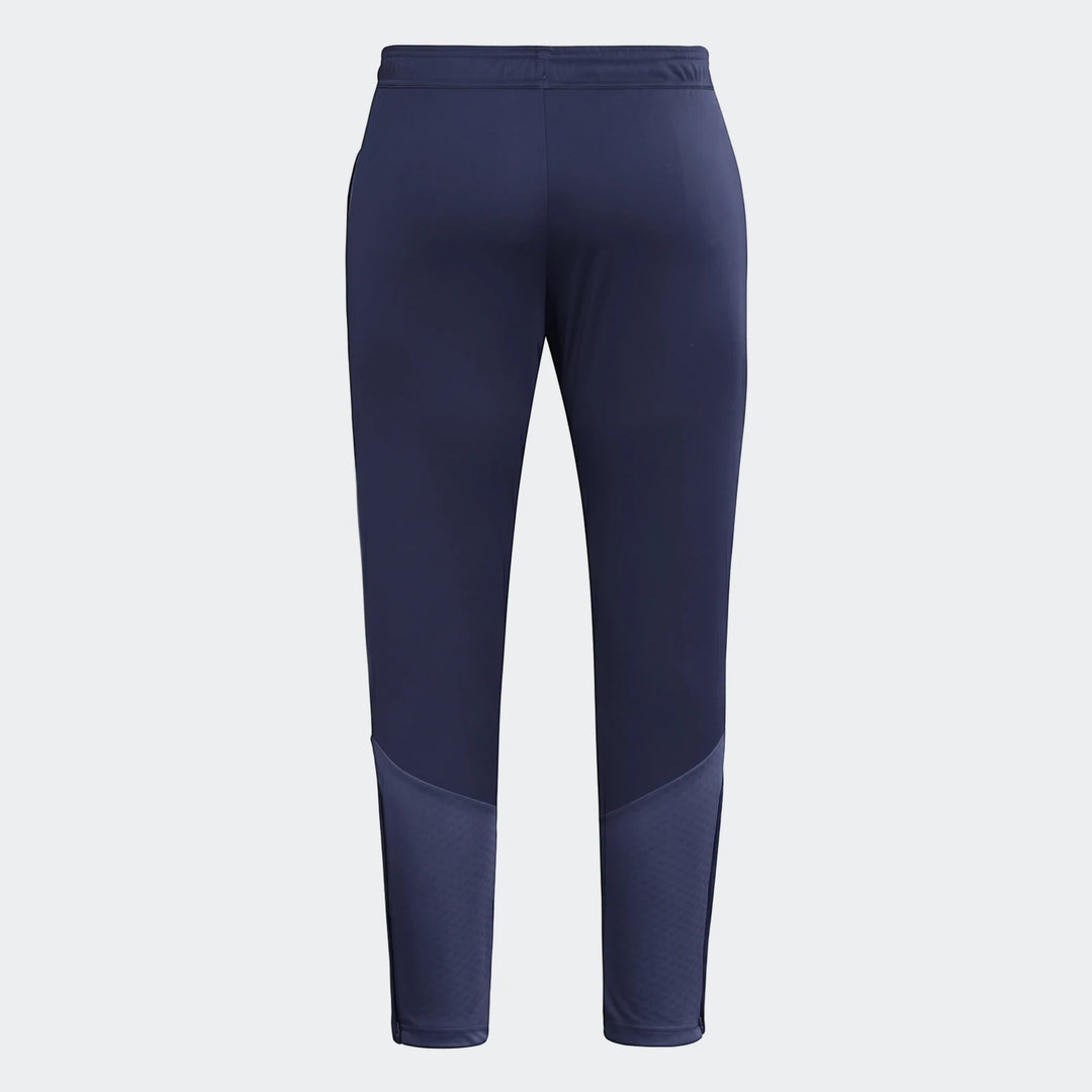 Dark blue men's Tiro26 C athletic training pants, shown from the back, featuring side stripes and textured panels.