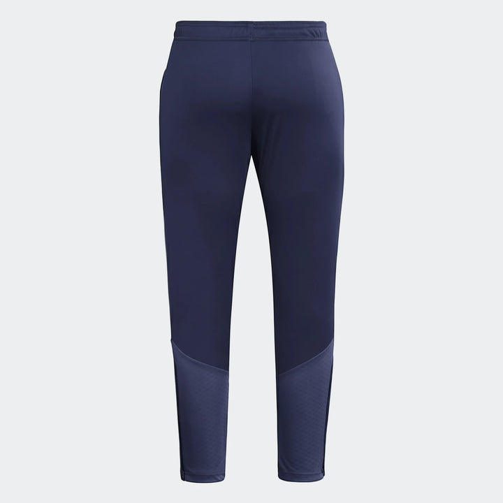 Dark blue men's Tiro26 C athletic training pants, shown from the back, featuring side stripes and textured panels.