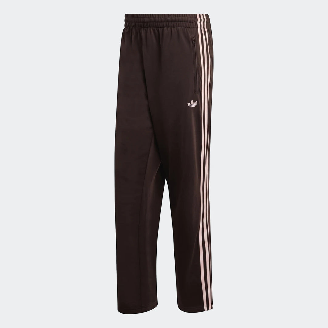 Dark brown Adidas Firebird track pants for men, featuring iconic white three-stripes and a Trefoil logo on the side,