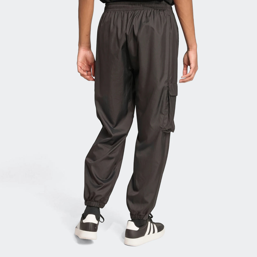 Dark grey Utility Woven Pants for men, seen from the back. Features include an elastic waistband, a single cargo pocket on