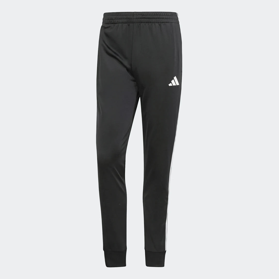 Black Adidas Dayready Tracksuit pants with white side stripes and logo, displayed against a grey background.