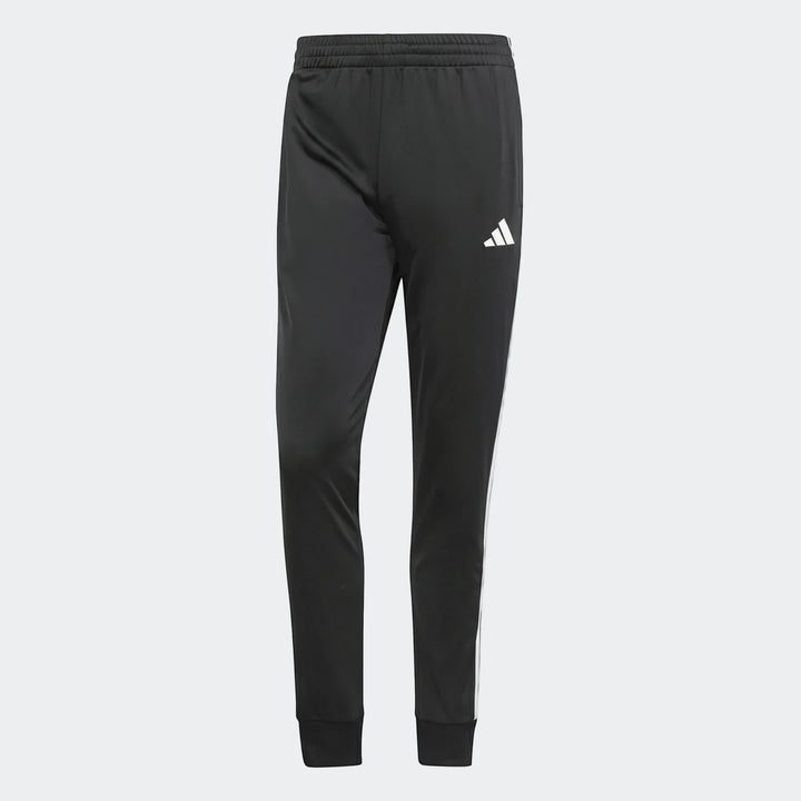 Black Adidas Dayready Tracksuit pants with white side stripes and logo, displayed against a grey background.