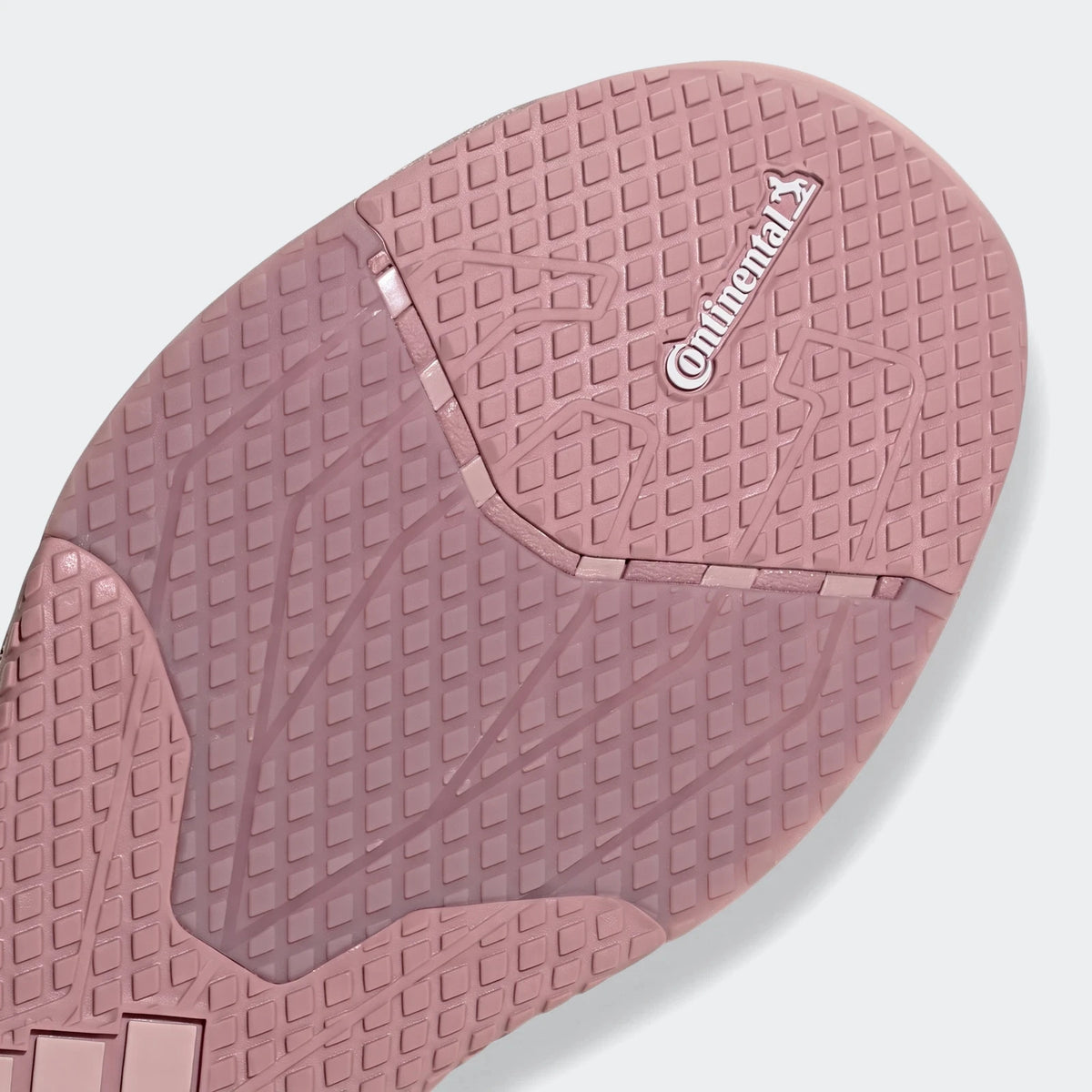 Pink and mauve rubber sole of Dropset 4 Training Shoes, featuring a Continental brand logo and a waffle-like tread pattern.