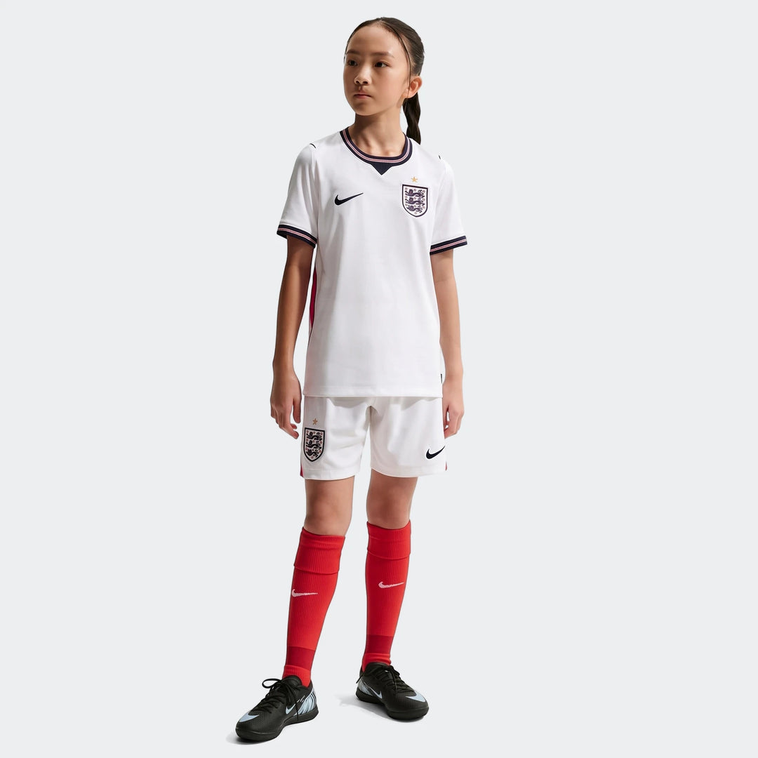 England National Team 2026 Stadium Home white big kids' Nike Dri-Fit soccer jersey, front view on a young girl.