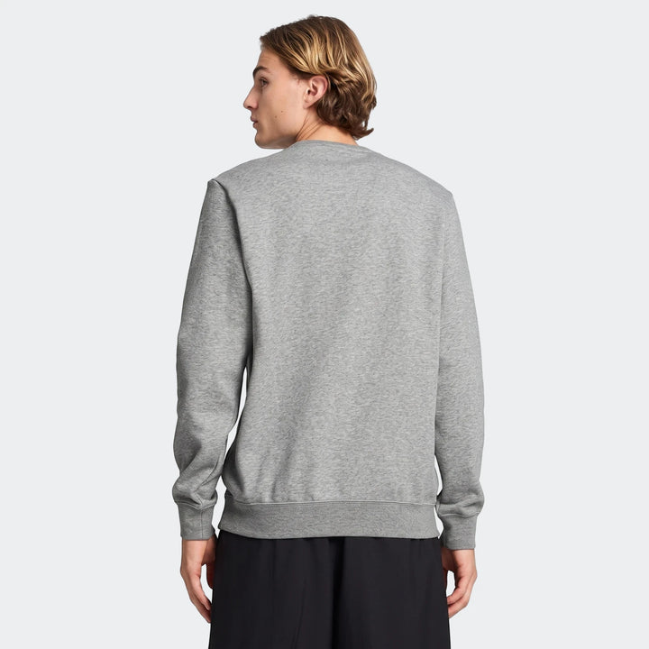 Rear view of a male model wearing a casual Ess No.1 Logo Crew Grey Sweatshirt, highlighting the comfortable fit and