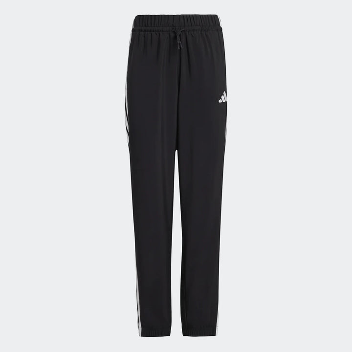 Kids' black Adidas Essentials Climacool tracksuit bottoms with white side stripes and a drawstring waist, shown on a white