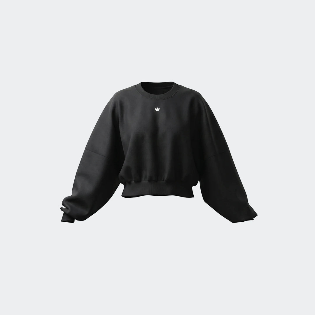 Black Essentials Fleece Crew Sweatshirt with a white logo, featuring an oversized fit and ribbed cuffs, presented on a gray