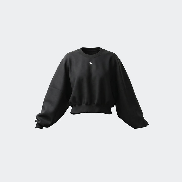 Black Essentials Fleece Crew Sweatshirt with a white logo, featuring an oversized fit and ribbed cuffs, presented on a gray