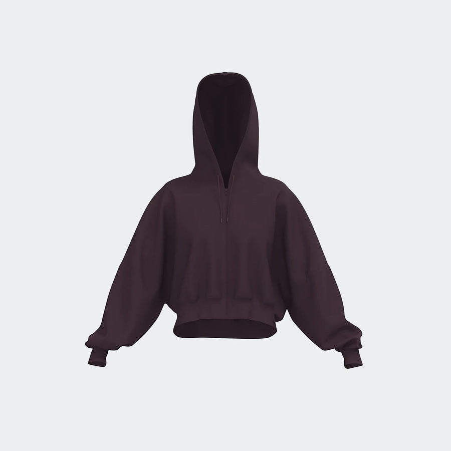 Essentials Full-Zip Hoodie in a dark plum color, shown from the front with the hood up, featuring a cropped length and