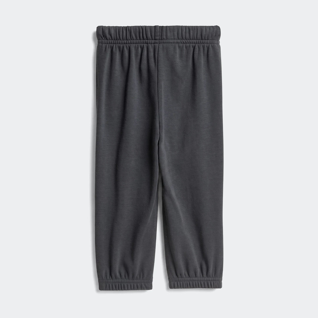 Dark grey Essentials Kids' Joggers in a comfortable fleece material, arranged flat on a white background, featuring