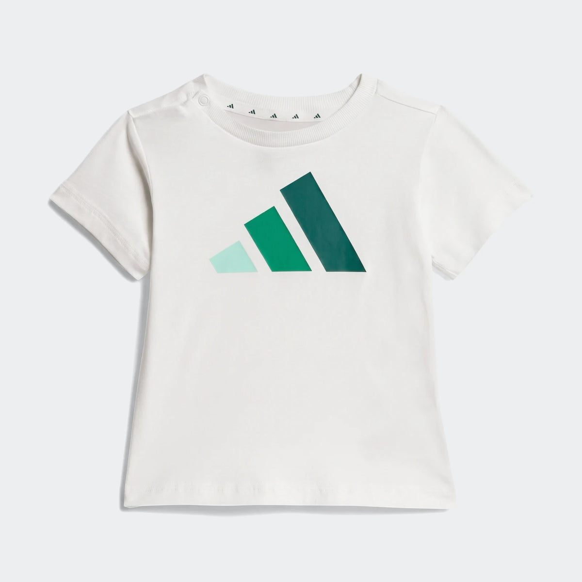 White kids' short-sleeve t-shirt with a green and light blue Adidas logo, featuring a ribbed crew neck and shoulder snap.