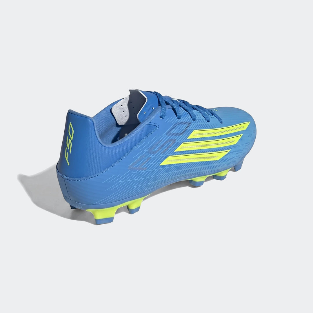 Blue and yellow Adidas F50 Club Firm Ground football boot, viewed from a slightly elevated side angle, showcasing the