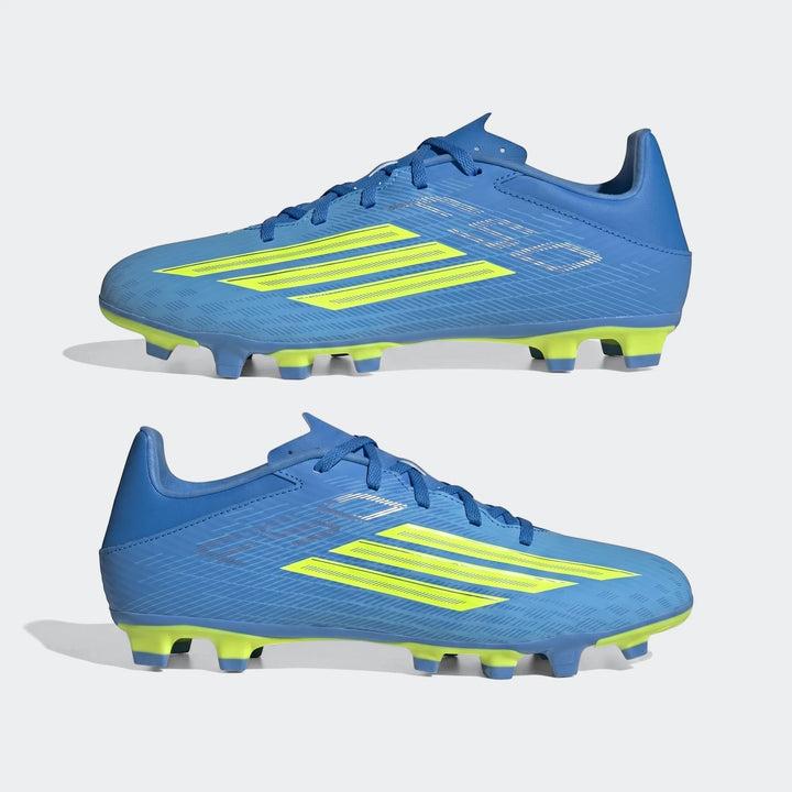 Two F50 Club Firm Ground / Multi Ground Football Boots in blue and neon yellow, shown from a side profile view, one boot