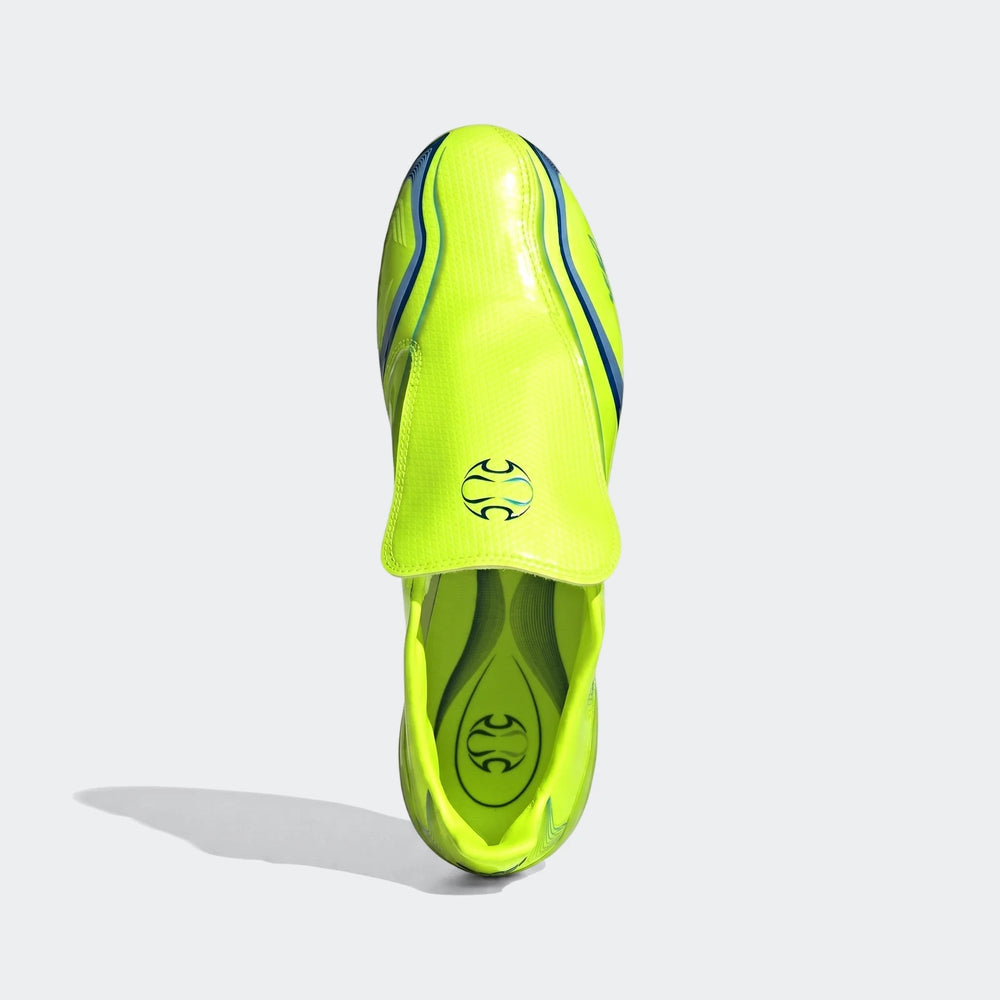 Top-down view of neon yellow F50 Elite Fg Tunit Football Boots with blue accents. These athletic cleats feature a sleek