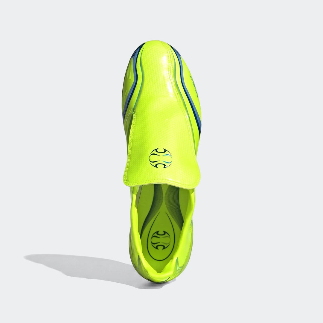Top-down view of neon yellow F50 Elite Fg Tunit Football Boots with blue accents. These athletic cleats feature a sleek