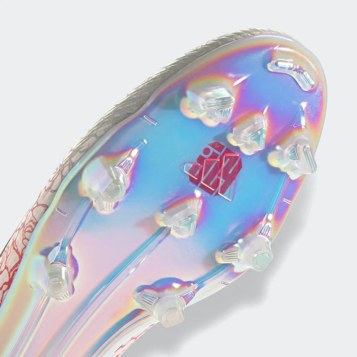Close-up of F50 Elite Ll Fg Lamine Yamal football boot showing its iridescent sole, clear studs, and red logo.