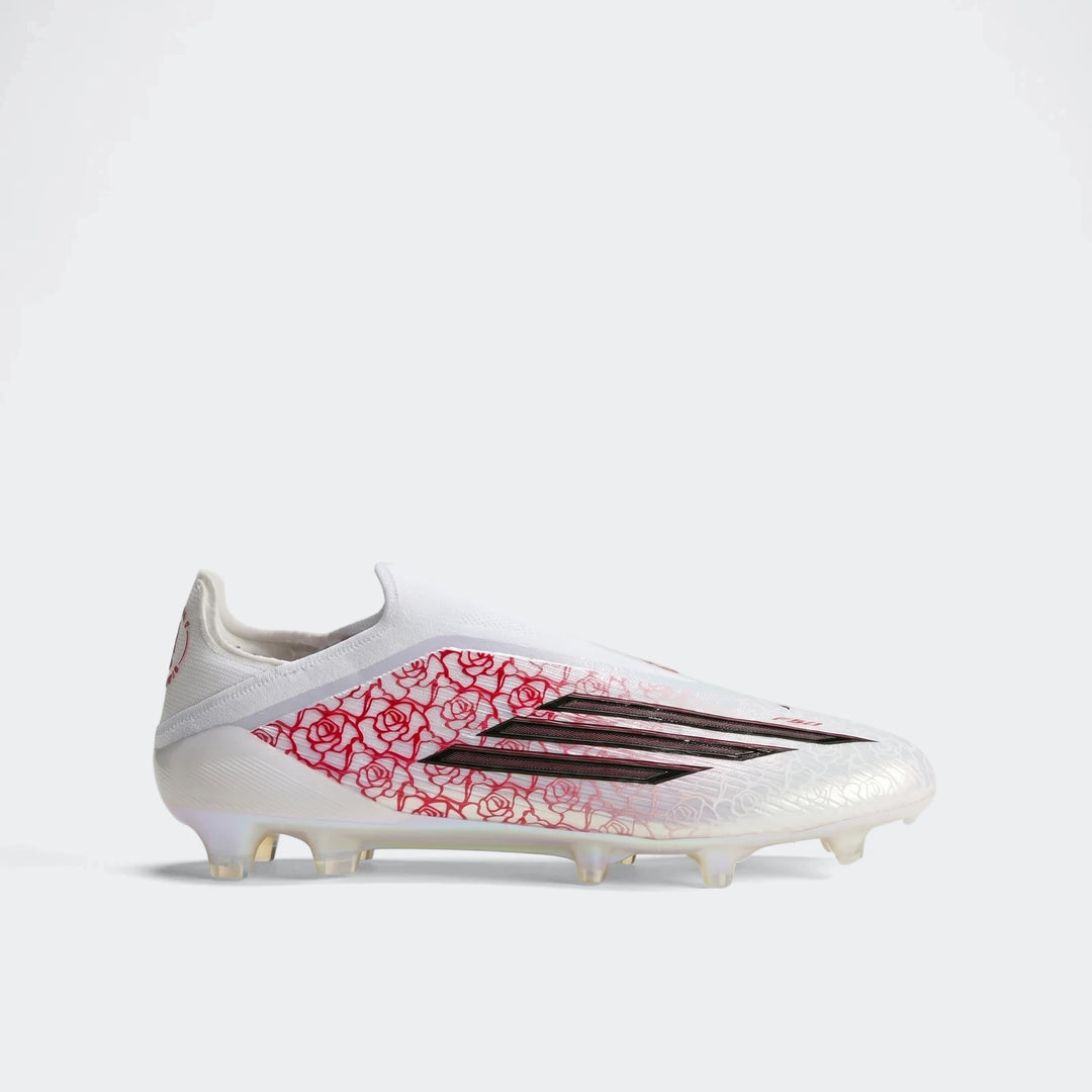 White F50 Elite Laceless FG Lamine Yamal football boots with vibrant red rose patterns and black stripes, presented in a