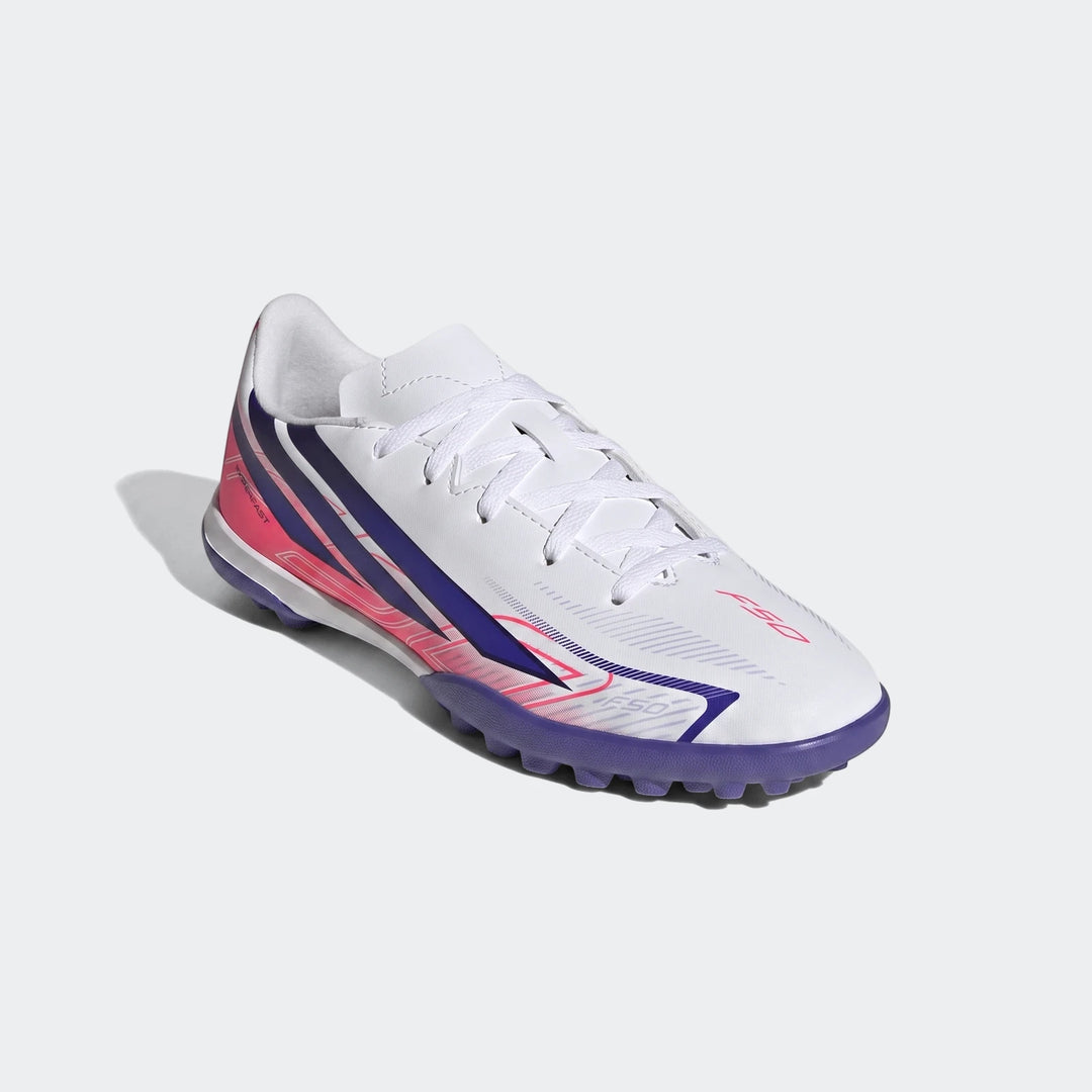 Kids F50 Hyperfast Club turf football boot in white with pink and purple stripes, shown from a three-quarter view.