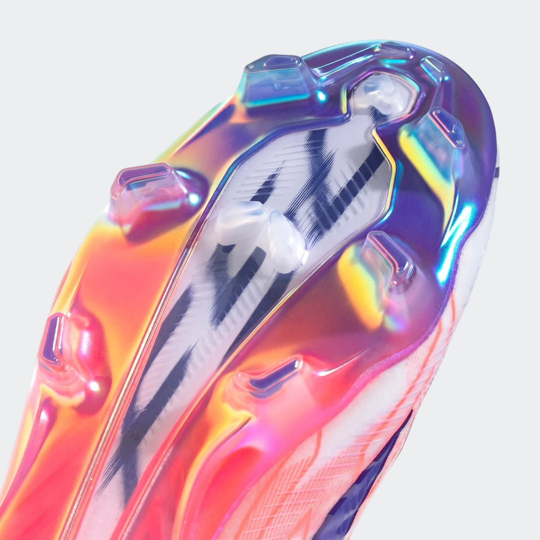 Close-up view of the iridescent sole of an F50 Hyperfast Elite Firm Ground Football Boot, featuring colorful studs and a