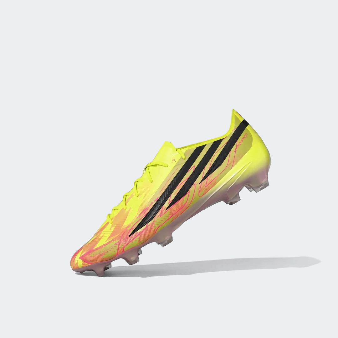 Yellow and black Adidas F50 Hyperfast Elite Firm Ground Football Boot with pink accents, side view.