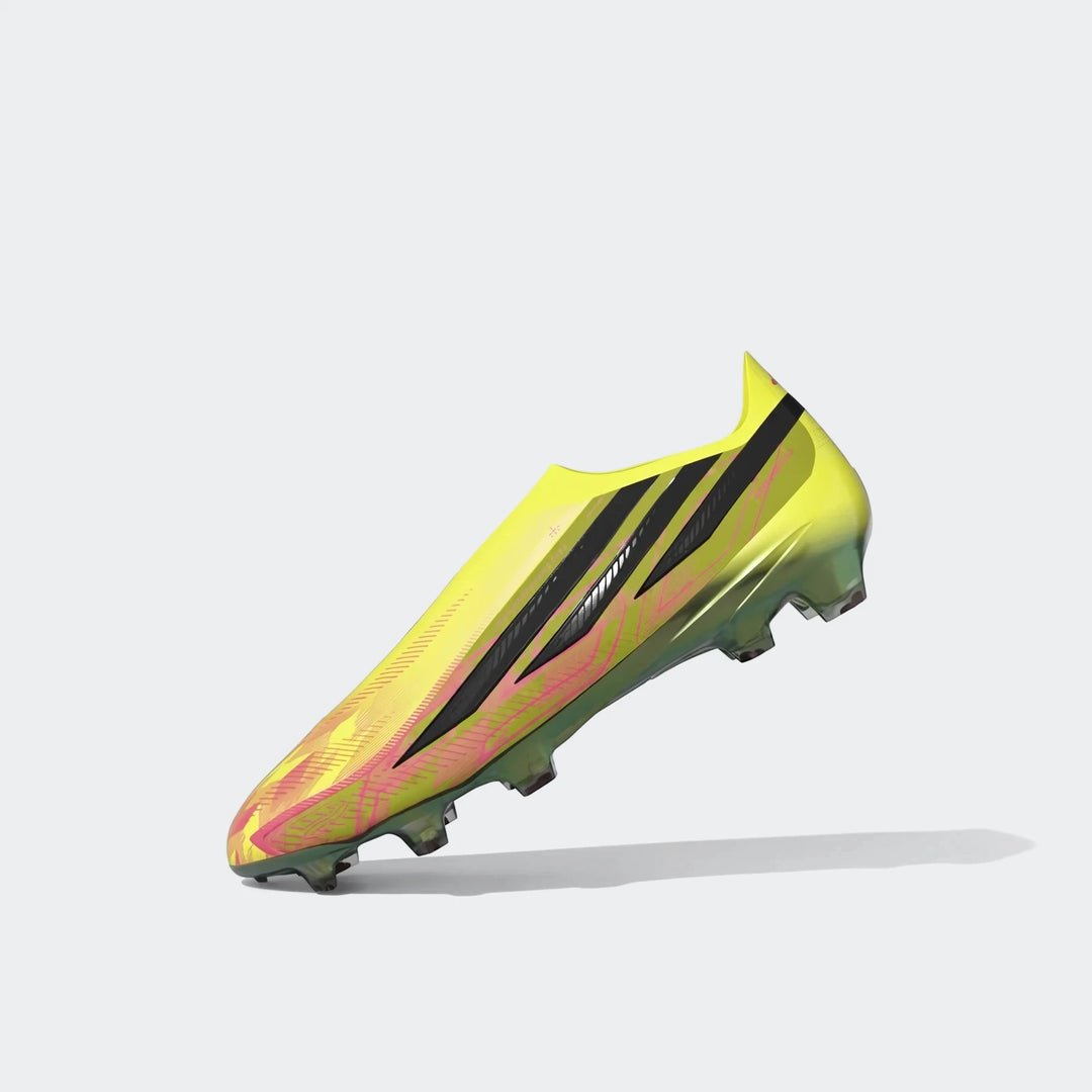 Yellow and pink F50 Hyperfast Elite Laceless Firm Ground Boots, designed for optimal performance on firm ground fields.