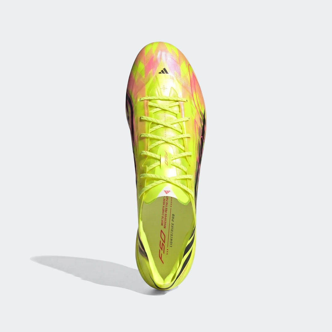 F50 Hyperfast Evo Firm Ground Football Boots in neon yellow, pink, and black, shown from a top-down perspective.