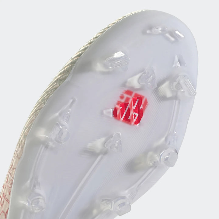 White and red F50 League Ll Fg / Mg Lamine Yamal football boots sole, close-up showing translucent studs and patterned