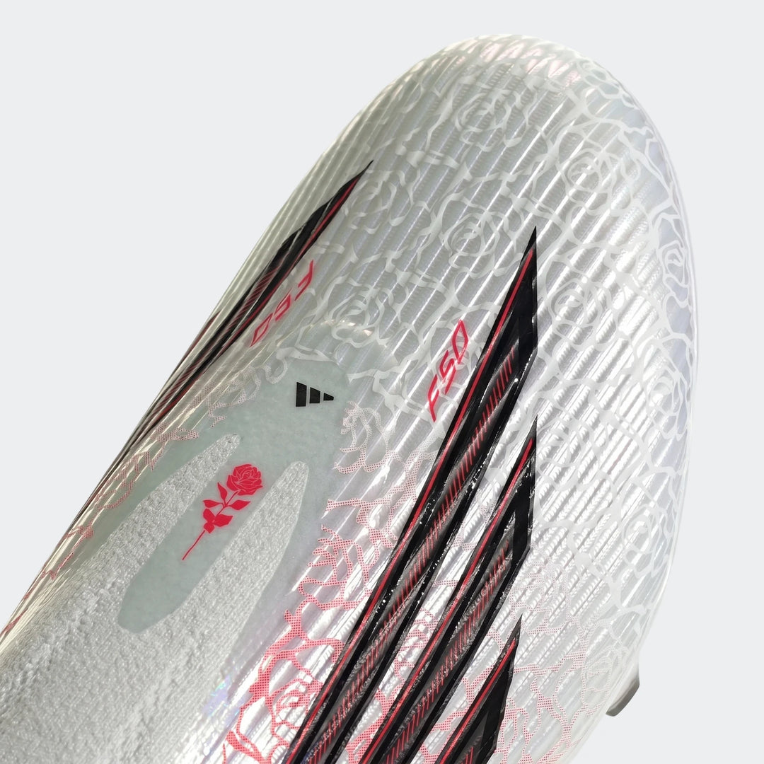 Close-up of Adidas F50 League Ll Fg / Mg Lamine Yamal football boots, featuring white and silver uppers with red F50