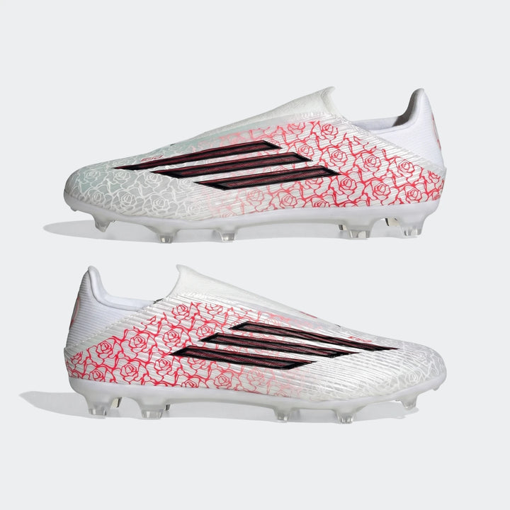 Pair of white F50 League LL FG/MG Lamine Yamal football boots with red rose pattern and black stripes, positioned side by