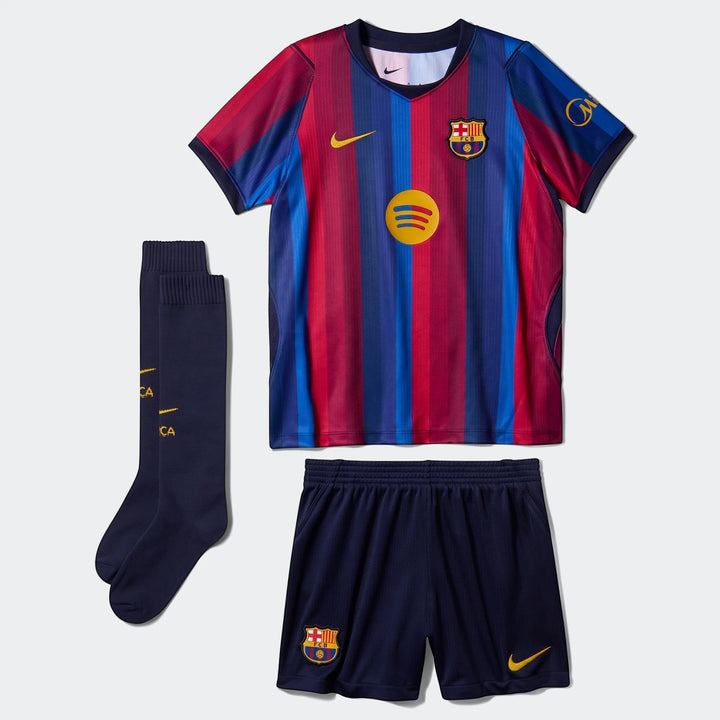 FC Barcelona 2026 Stadium Home Little Kids' Nike Soccer Replica 3-Piece Kit with red and blue striped jersey, navy shorts,