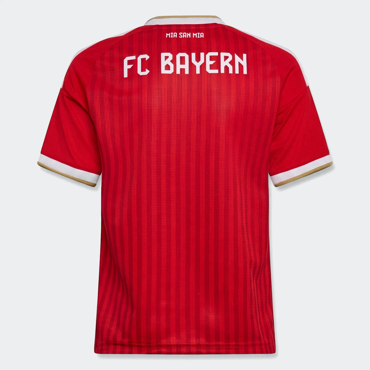 Red Fc Bayern 26/27 Home Jersey for kids, showcasing the back view with 'FC BAYERN' and 'MIA SAN MIA' text, and a distinct