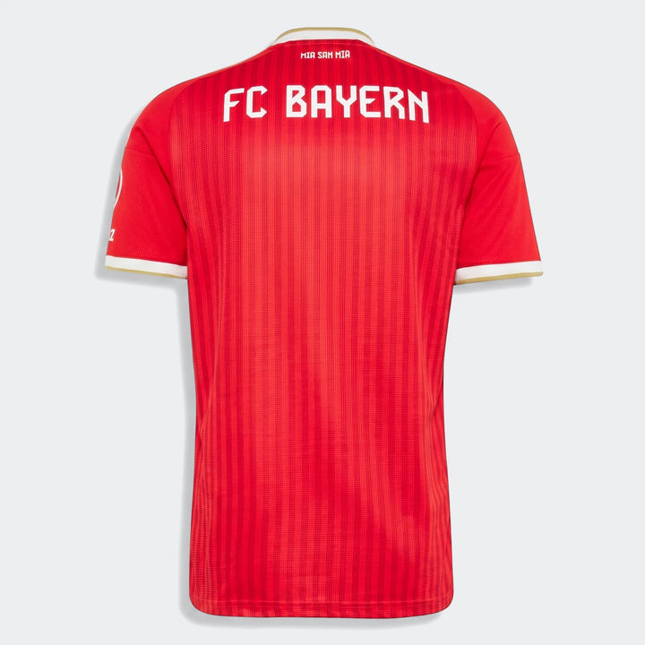 Fc Bayern 26/27 Home Jersey, red with white and gold trim, featuring 'FC BAYERN' and 'MIA SAN MIA' on the back.