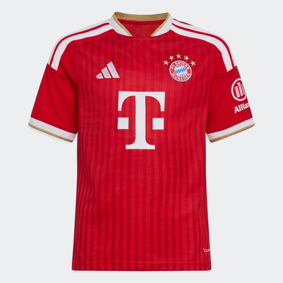 FC Bayern 26/27 Kids Home Jersey in red with white and gold accents, featuring club crest, Adidas logo, and sponsor logos on