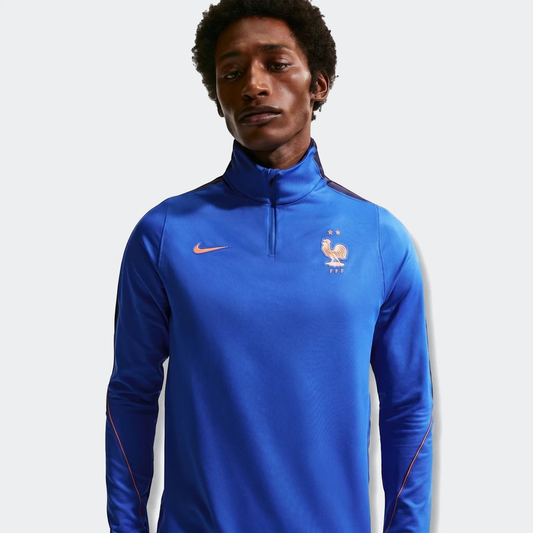 Blue FFF Strike Men's Nike Dri-Fit long-sleeve soccer drill top worn by a male model, chest-up view.