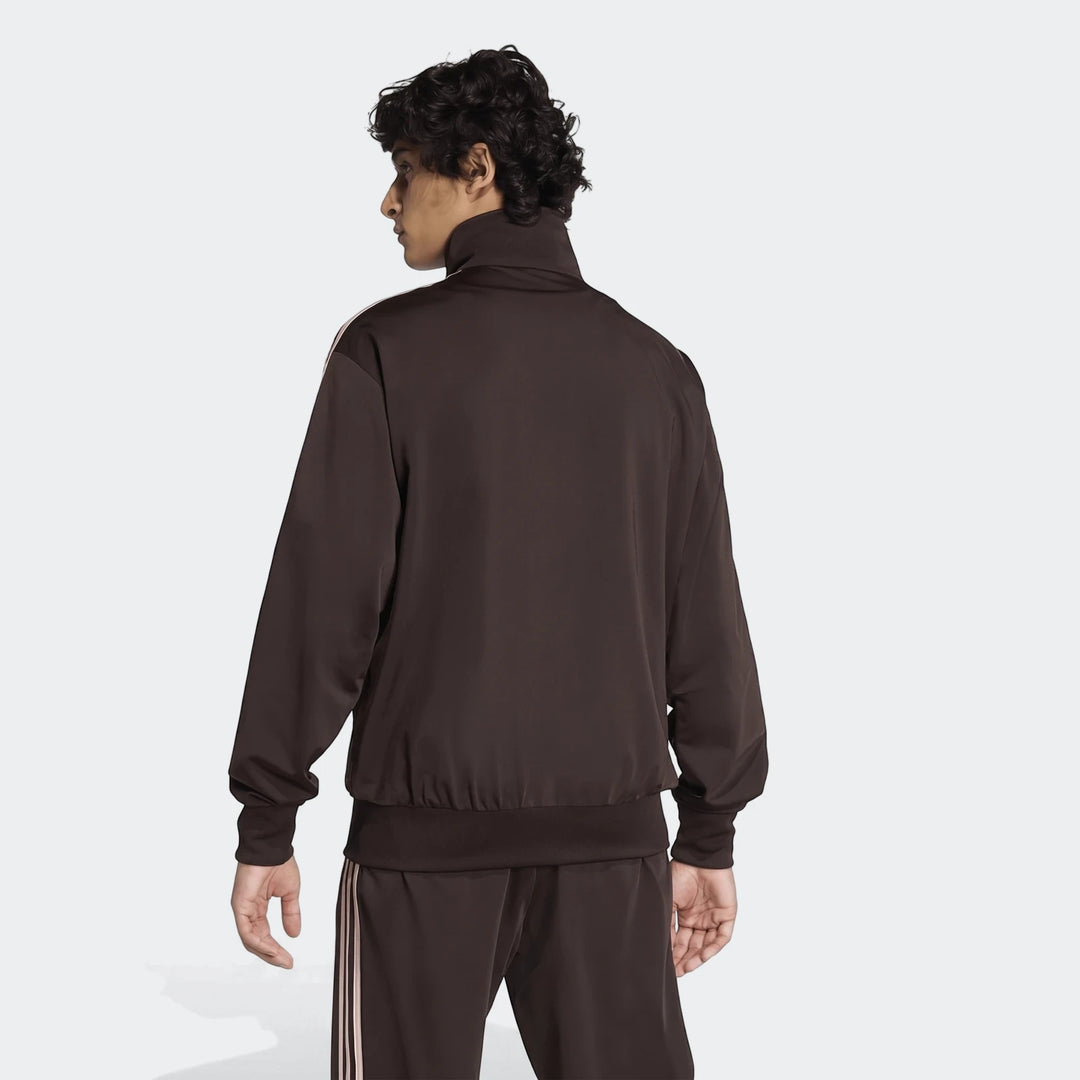 Dark brown Firebird Track Top and matching pants on a male model from the back view, showing stripes on sleeves and pants.